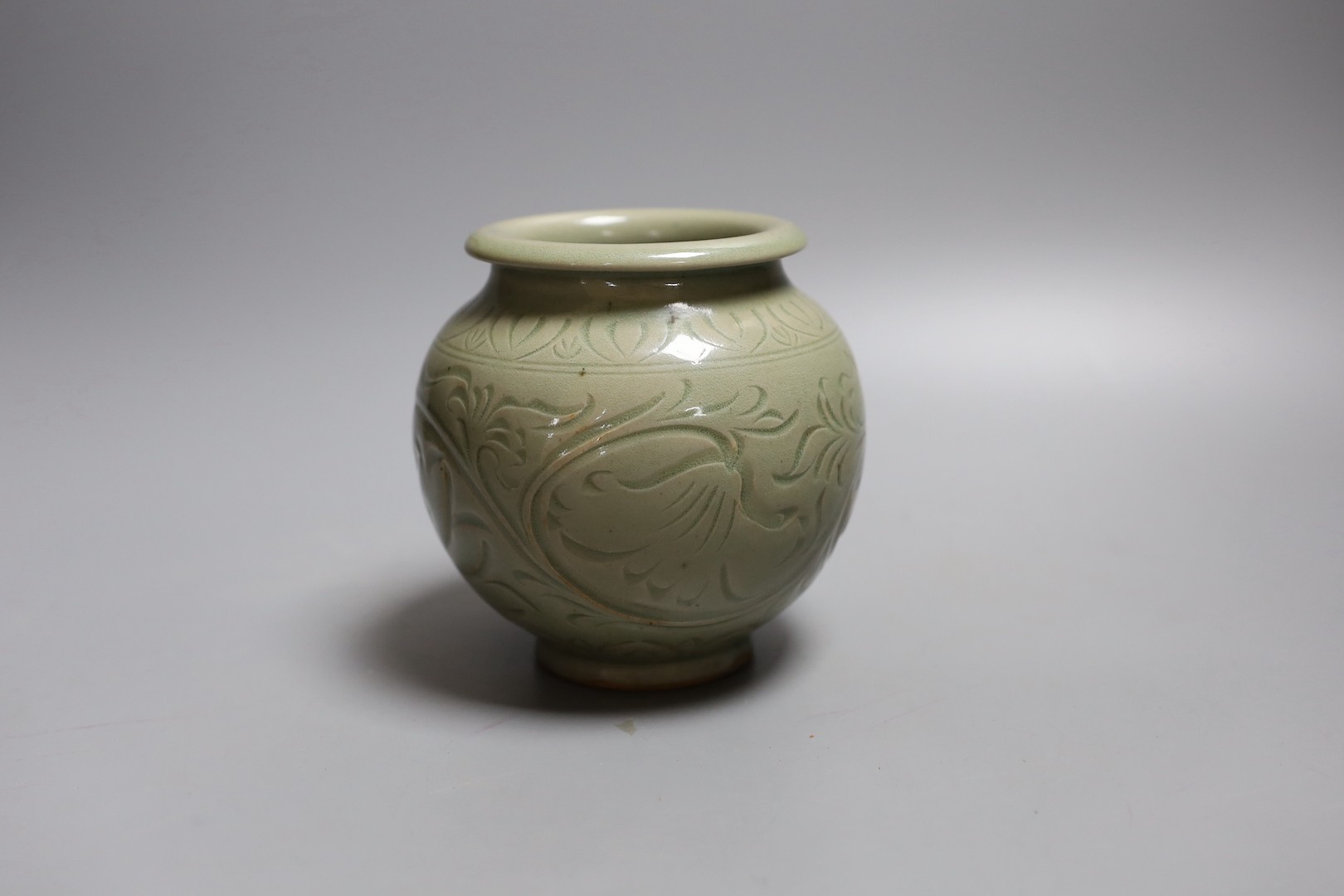 A Chinese celadon globular jar, 12cm